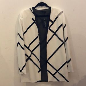 David Koma white mesh cut out blazer.